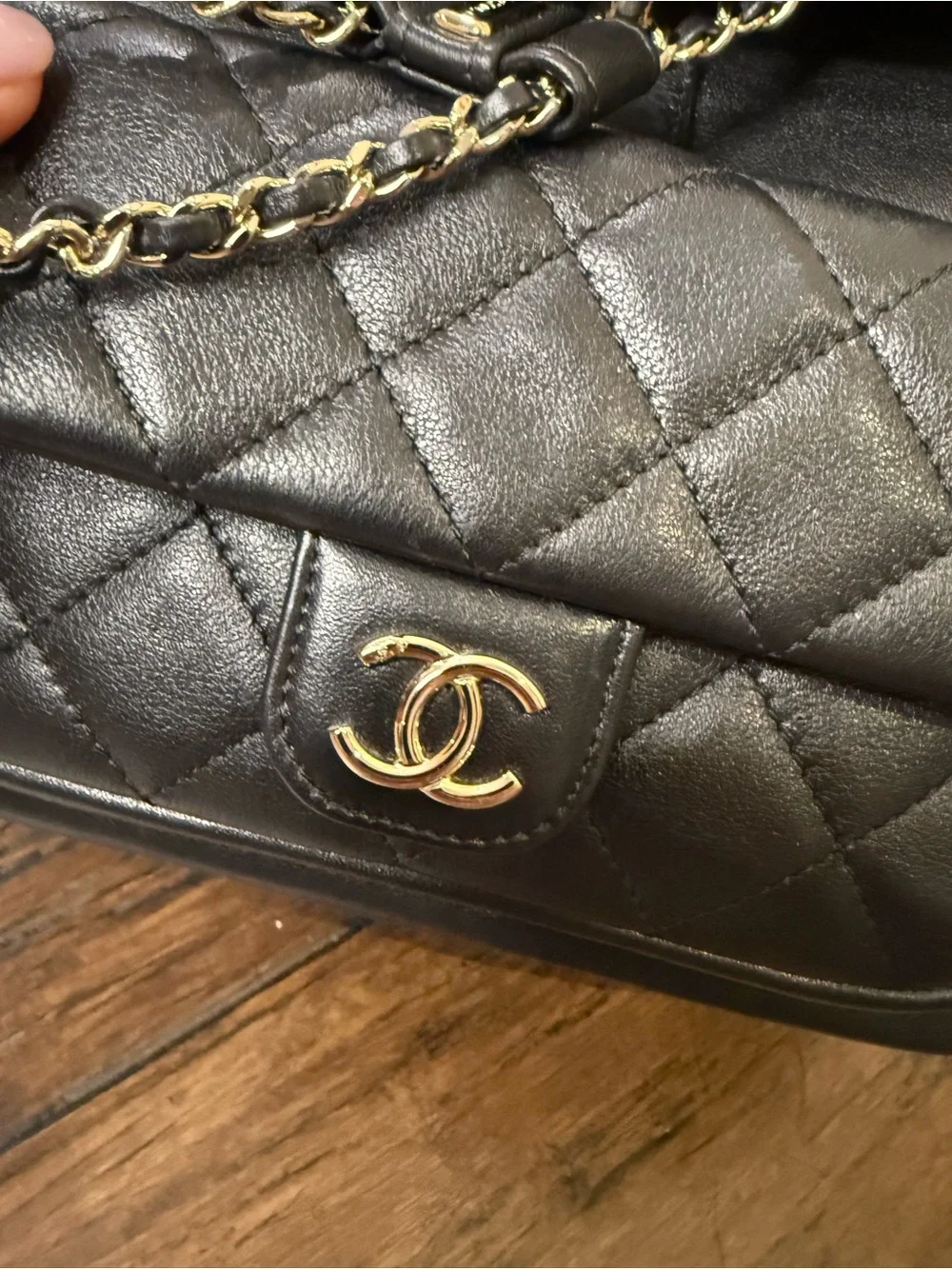 Black Quilted Leather Backpack in with Gold hardware